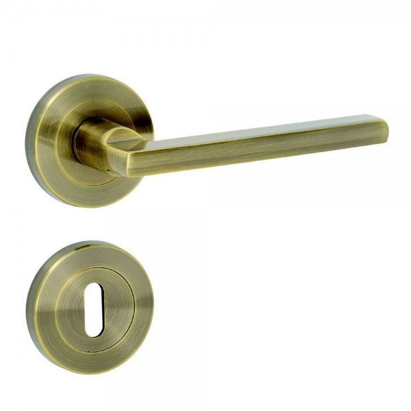 Cortina Door Handle on Rose - Antique Brass