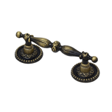 Antique cupboard handle in antique brass