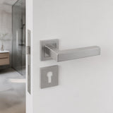 Square stainless steel lever handle on rose