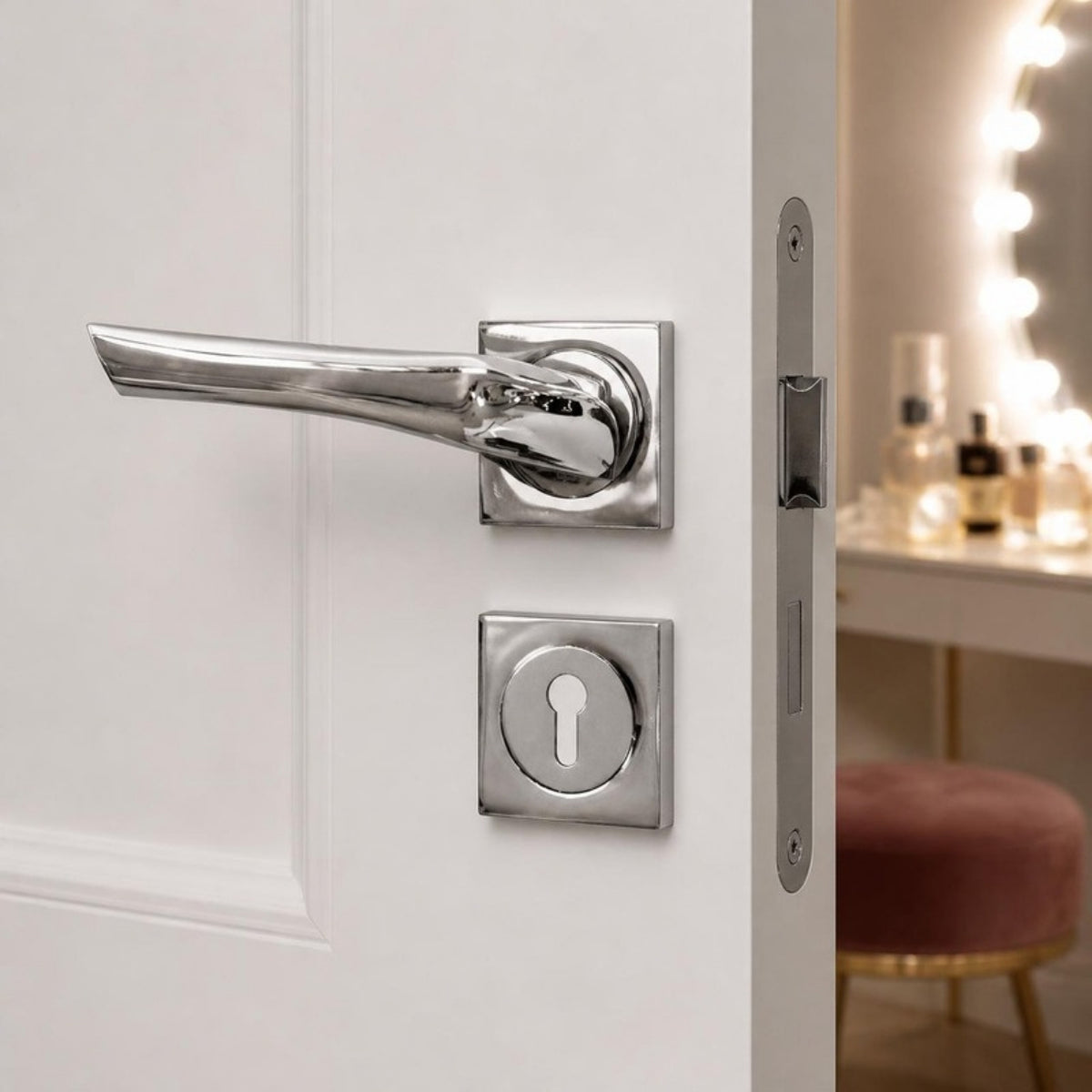 Indented lever handle on rose - shiny chrome