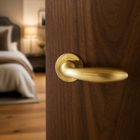 Solid brass rippled lever handle on rose