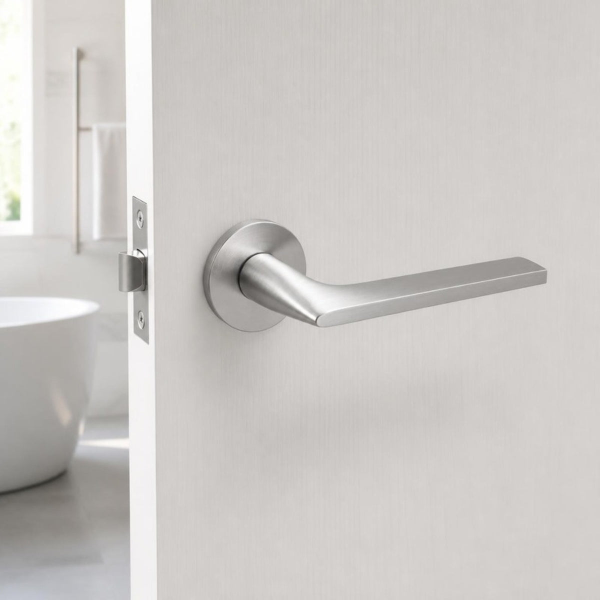 Tupai 4251 lever handle on rose round Satin Chrome
