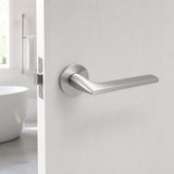 Tupai 4251 lever handle on rose round Satin Chrome