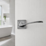 Shiny chrome designer lever handle on square rose