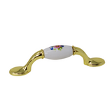 classic handle with porcelain insert and flower print cupboard handle