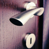 Sambava - Solid Stainless Steel Lever Handle on Rose door handle on rose