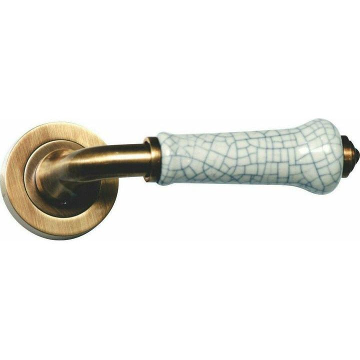 Ceramic lever handle on rose - Decor Handles