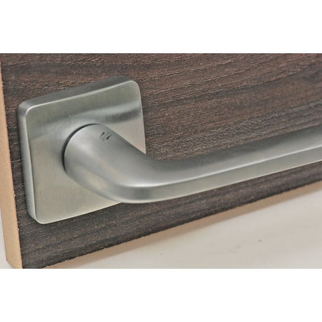 Exclusive Italian lever handle on square rose