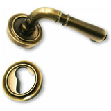 Aurelia Italian lever door handle on round rose